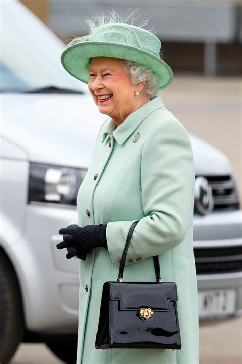 The Story Behind The Queen’s Lifelong Devotion to Launer Handbags